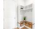 Mudroom features storage, bench seat, hooks, and cubbies for shoes and coats at 127 Archdale St, Summerville, SC 29486
