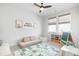 Playroom with decor, toy storage, seating and a modern ceiling fan at 127 Archdale St, Summerville, SC 29486