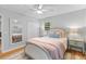 Relaxing bedroom featuring hardwood floors, ceiling fan, and ensuite bathroom at 1303 Teal Ave, Charleston, SC 29412