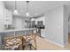 Stylish kitchen with seating at the bar, stainless appliances, and modern pendant lighting at 1303 Teal Ave, Charleston, SC 29412