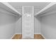 Bright walk-in closet with built in storage, shelving and hanging space at 1303 Teal Ave, Charleston, SC 29412