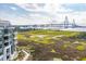 Stunning aerial view of waterfront condo and Ravenel Bridge at 136 Cooper River Dr, Mount Pleasant, SC 29464
