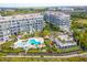 Aerial view of the condo complex, pools, and community areas at 136 Cooper River Dr, Mount Pleasant, SC 29464