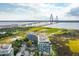 Scenic aerial shot of condo, marshland, and the Ravenel Bridge at 136 Cooper River Dr, Mount Pleasant, SC 29464