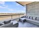 Relaxing outdoor balcony with comfortable seating and views of grassy terrain at 136 Cooper River Dr, Mount Pleasant, SC 29464