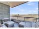 Relaxing outdoor balcony offering panoramic marsh views and comfortable seating at 136 Cooper River Dr, Mount Pleasant, SC 29464