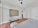 Comfortable bedroom with a large map display, wood floors, and white trim at 136 Cooper River Dr, Mount Pleasant, SC 29464