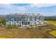 Luxurious condo building with stunning landscaping at 136 Cooper River Dr, Mount Pleasant, SC 29464