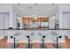 Kitchen island with bar seating offers a sleek design, stainless steel appliances, and pendant lighting at 136 Cooper River Dr, Mount Pleasant, SC 29464