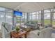 Bright and airy living room featuring comfortable seating and beautiful marsh views at 136 Cooper River Dr, Mount Pleasant, SC 29464