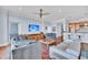 Open concept living room with hardwood floors and modern decor with views to kitchen at 136 Cooper River Dr, Mount Pleasant, SC 29464