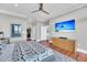 Neutral bedroom with a ceiling fan, TV, and hardwood floors at 136 Cooper River Dr, Mount Pleasant, SC 29464