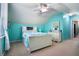 Bright bedroom features a cozy bed with white furniture and tranquil blue walls and vaulted ceiling at 138 Avalon Rd, Summerville, SC 29483
