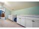 Upstairs bonus room features multiple built-in cabinets, great for storage and functionality at 138 Avalon Rd, Summerville, SC 29483