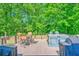Outdoor deck featuring patio table with seating and built in grilling station perfect for outdoor entertaining at 138 Avalon Rd, Summerville, SC 29483