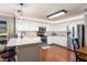 Bright kitchen featuring white cabinetry, stainless steel appliances, granite countertops, and an eat-in island at 138 Avalon Rd, Summerville, SC 29483