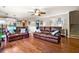 Open floor plan with hardwood floors connecting the living room and kitchen, perfect for entertaining guests at 138 Avalon Rd, Summerville, SC 29483