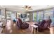 Comfortable living room featuring hardwood floors, a ceiling fan, built-ins, and ample seating space for relaxation at 138 Avalon Rd, Summerville, SC 29483