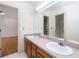 Bright bathroom featuring a double sink vanity, neutral countertop, and a large mirror at 1415 Inland Creek Way, Mount Pleasant, SC 29464