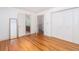Bedroom featuring hardwood floors and access to the bathroom and closets at 1415 Inland Creek Way, Mount Pleasant, SC 29464