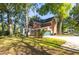 Two-story brick and siding home with attached garage and a lush lawn at 1415 Inland Creek Way, Mount Pleasant, SC 29464