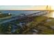 Aerial view of a bridge over a waterway with buildings, parks, and wetlands at 1423 Dahlia Dr, Mount Pleasant, SC 29464
