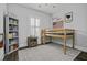 A bedroom features a lofted bed with a bookshelf and playful decor against gray walls at 1488 Croaton Crsg, Mount Pleasant, SC 29466