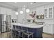 Bright kitchen with white cabinets, a marble countertop island, and modern stainless steel appliances at 1488 Croaton Crsg, Mount Pleasant, SC 29466