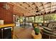Inviting screened porch with an outdoor seating area and dining table at 1514 Gardenia Rd, Charleston, SC 29407