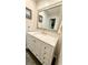 Bathroom featuring a large vanity with marble countertops and ample storage space and a large mirror at 1521 Camp Rd, Charleston, SC 29412
