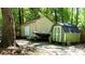 Property includes 2 storage sheds, one with a boat parked on the side at 1521 Camp Rd, Charleston, SC 29412