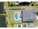 An aerial shot capturing the beautiful pool, backyard, and pond view of the property at 1537 Fishbone Dr, Johns Island, SC 29455