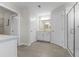 Bright bathroom with white cabinetry, quartz countertops, and a glass-enclosed shower at 1537 Fishbone Dr, Johns Island, SC 29455
