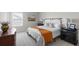 Cozy bedroom with soft textures, side tables, and a decorative blanket at 1537 Fishbone Dr, Johns Island, SC 29455