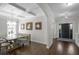 Open-concept dining room boasting contemporary lighting and stylish furnishings at 1537 Fishbone Dr, Johns Island, SC 29455