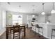 Bright kitchen and dining area with stainless appliances, sleek countertops, and lots of natural light at 1537 Fishbone Dr, Johns Island, SC 29455