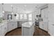 Modern kitchen with stainless steel appliances, granite countertops, and lots of natural light from multiple windows at 1537 Fishbone Dr, Johns Island, SC 29455