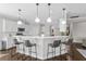 This kitchen features sleek countertops and seating area; perfect for casual dining and entertaining guests at 1537 Fishbone Dr, Johns Island, SC 29455