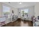 Bright playroom with lots of windows, natural light, and space for  at 1537 Fishbone Dr, Johns Island, SC 29455