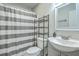 Clean bathroom featuring a full shower and tub, modern fixtures, and ample storage space at 184 Tabby Creek Cir, Summerville, SC 29486