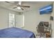 Comfortable bedroom featuring a ceiling fan, flatscreen television, and nearby bathroom at 184 Tabby Creek Cir, Summerville, SC 29486