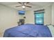 Relaxing bedroom featuring a ceiling fan, flatscreen television, and a brightly lit window at 184 Tabby Creek Cir, Summerville, SC 29486