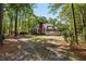 Expansive backyard featuring a brick home with a spacious deck, perfect for outdoor entertaining at 1855 Cherokee Rose Cir, Mount Pleasant, SC 29466