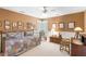 Warm bedroom featuring a bed, rocking chair, and stylish decorations at 1855 Cherokee Rose Cir, Mount Pleasant, SC 29466