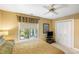 Comfortable bedroom with window, ceiling fan, and carpeted floor at 1855 Cherokee Rose Cir, Mount Pleasant, SC 29466