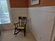 Bedroom chair with a yellow cushion near the window at 1855 Cherokee Rose Cir, Mount Pleasant, SC 29466