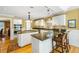 Gourmet kitchen with granite counters, stainless appliances and breakfast bar seating at 1855 Cherokee Rose Cir, Mount Pleasant, SC 29466