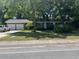 Charming single story brick home with an attached two car garage and mature trees at 1866 Ashley Hall Rd, Charleston, SC 29407