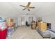 Spacious attic offering ample storage space, well-lit with a ceiling fan at 195 Edinburgh St, Summerville, SC 29483