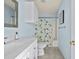 Bright bathroom featuring a modern vanity, colorful shower curtain, and updated fixtures at 195 Edinburgh St, Summerville, SC 29483